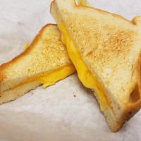 Melted Cheese Sandwich · American and provolone cheese on white bread. Option to add bacon or ham for an additional c...