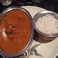 Chicken Tikka Masala · Traditional North Indian sauce made from Roma tomatoes simmered on slow fire to obtain a smo...