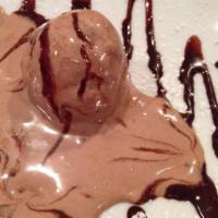 Profiteroles · Chocolate coated cream puffs 