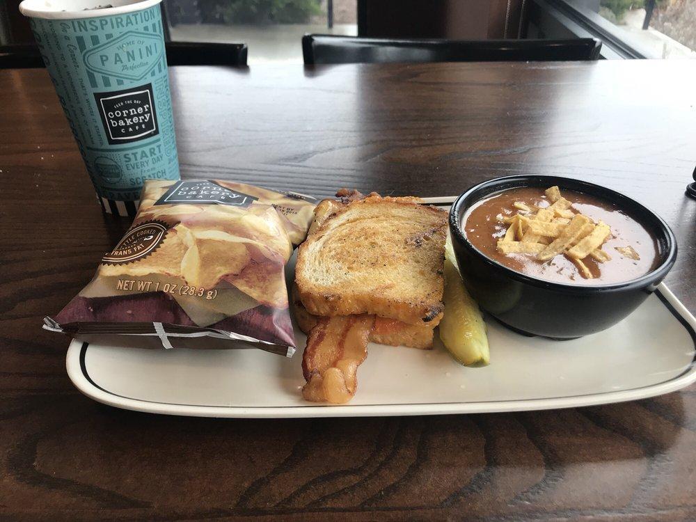 Club Panini · Oven-roasted turkey, bacon, cheddar, tomato, mayonnaise, grilled sourdough.