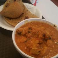 Curry Chicken Dinner · Served with a spicy vegetable of your choice, a paratha, vegetable samosa and basmati rice. 