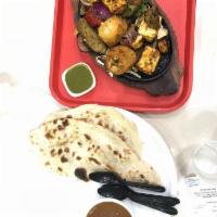 Tandoori Platter · Potatoes, cottage cheese, green kabab, toasted vegetable coocked in coal heated oven.