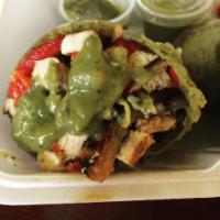 Pesto Wrap · Grilled chicken, roasted red peppers, sun dried tomatoes, sprouts and our homemade pesto sau...