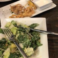 Caesar Salad · Vegetarian. Fresh romaine lettuce, house herbed croutons and Parmesan.