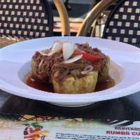 Tostones Rellenos · Stuffed plantain cups. Your choice of protein.