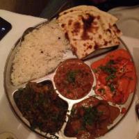 Taj Thali · An assortment of makhani chicken, lamb roganjosh, beef palak and dal makhani.  Served with b...