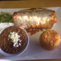 Wet Burrito · 1 flour tortilla filled with meat of your choice ground beef, barbacoa, chicken, pork, veget...