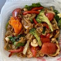 Pad Kee Mao · Drunken noodle. Wide rice noodle, dark soy sauce, egg, carrot, onion, mushroom, bell pepper,...