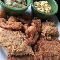 Seafood Platter · Fried farm raised catfish, shrimp, gulf oysters and stuffed crab served with hush puppies an...