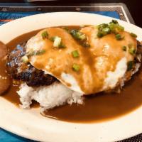 Loco Moco · Two quarter pound, seasoned ground beef hamburger patties cooked to medium well and two over...