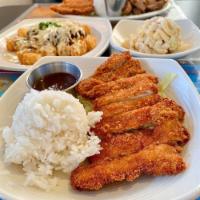 Chicken Katsu · Perfectly seasoned chicken thighs breaded in panko Japanese bread crumb then deep fried to g...
