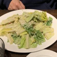 Caesar Salad · Green salad with Caesar dressing and cheese. Add anchovies and avocado for an additional cha...