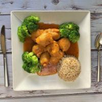 Orange Imagination · Battered soy chicken sauteed with orange sauce, served with broccoli. Served with brown rice...