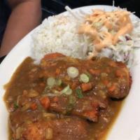 Katsu Curry · Breaded chicken cutlet served over steamed rice topped with house-made curry.