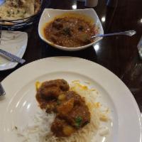 Lamb Vindaloo · Boneless, tender lamb is simmered in a spicy and red chili sauce.