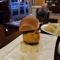 Bombay Burger · A spicy potato patty tucked in a bun a.k.a. vada pav.
