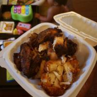Jerk Chicken · Delicious Jamaican style Jerk chicken serve with any side of your choice.