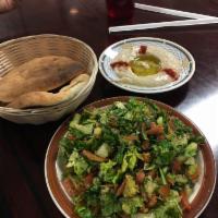 Fattoush Salad · Lettuce, tomatoes, parsley, onion, mint, cracked wheat, fresh lemon juice and the best of vi...