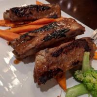 Asian Baby Back Ribs · With sweet potato fries.