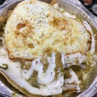 Chilaquiles · Freshly fried tortilla chips topped with green or red salsa, 2 eggs, sour cream & cheese. 