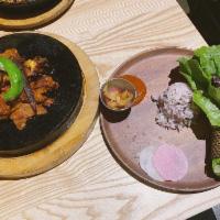 Pork Bulgogi · Thinly sliced pork shoulder, marinated in sweet&spicy sauce, then grilled with mushrooms, on...