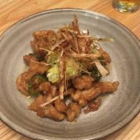 Leeky Chicken · Fried boneless chicken thighs tossed in sweet-tangy soy sauce with jalapeño, garlic flakes, ...