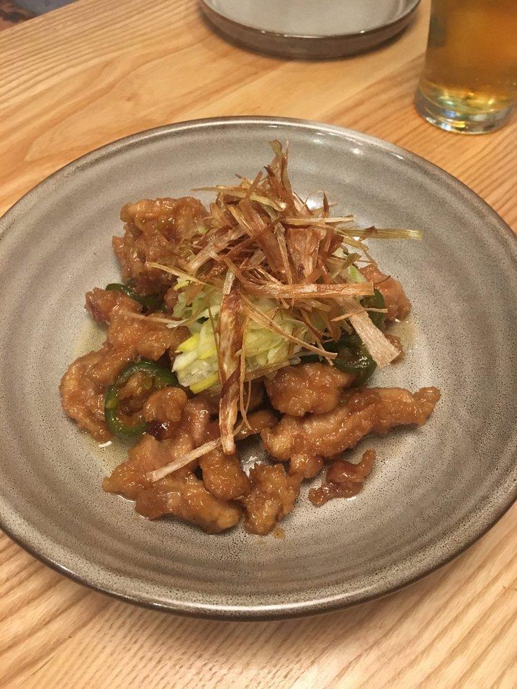 Leeky Chicken · Fried boneless chicken thighs tossed in sweet-tangy soy sauce with jalapeño, garlic flakes, pickled leek and fried leek.