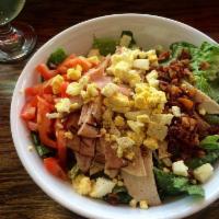 The Cobb Salad · Romaine, Saag's Black Forest ham, house roasted turkey breast, hard boiled egg, bacon, tomat...