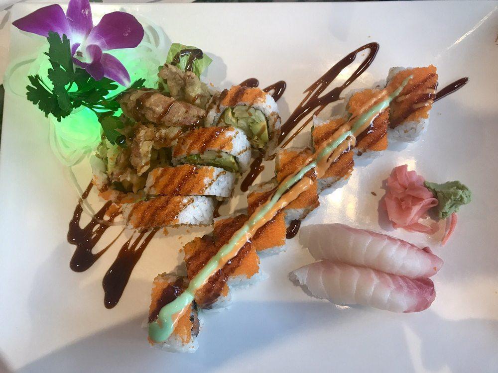 Spider Roll · Soft shell crab, cucumber, avocado, green leaf, tobiko, spicy mayo and eel sauce. Tall size.