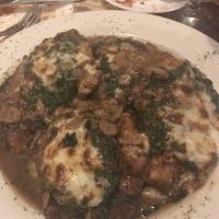 Chicken Florentine · Lightly egg battered, sauteed, and topped with creamed spinach and mozzarella in a demi-glaz...