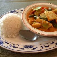 Panang Curry · Panang curry in coconut milk with bell pepper, string bean and lime leaves.