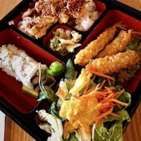 True Bento Box · White chicken teriyaki over rice, tempura shrimp, California roll and side salad with ginger...