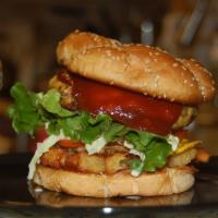 Tower Burger · 1/3 pound Angus beef patty topped with American cheese, lettuce, tomato, crunchy french-frie...