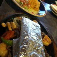 Alebrije Fajitas · A flavorful marinated, juicy and tender charbroiled assortment of steak, chicken, and shrimp...
