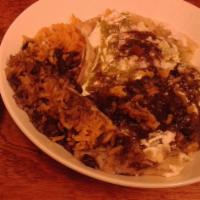 Huevos Rancheros · Mexican style eggsAuthentic Mexican Breakfast your choice tomatillo sauce or red sauce, chee...
