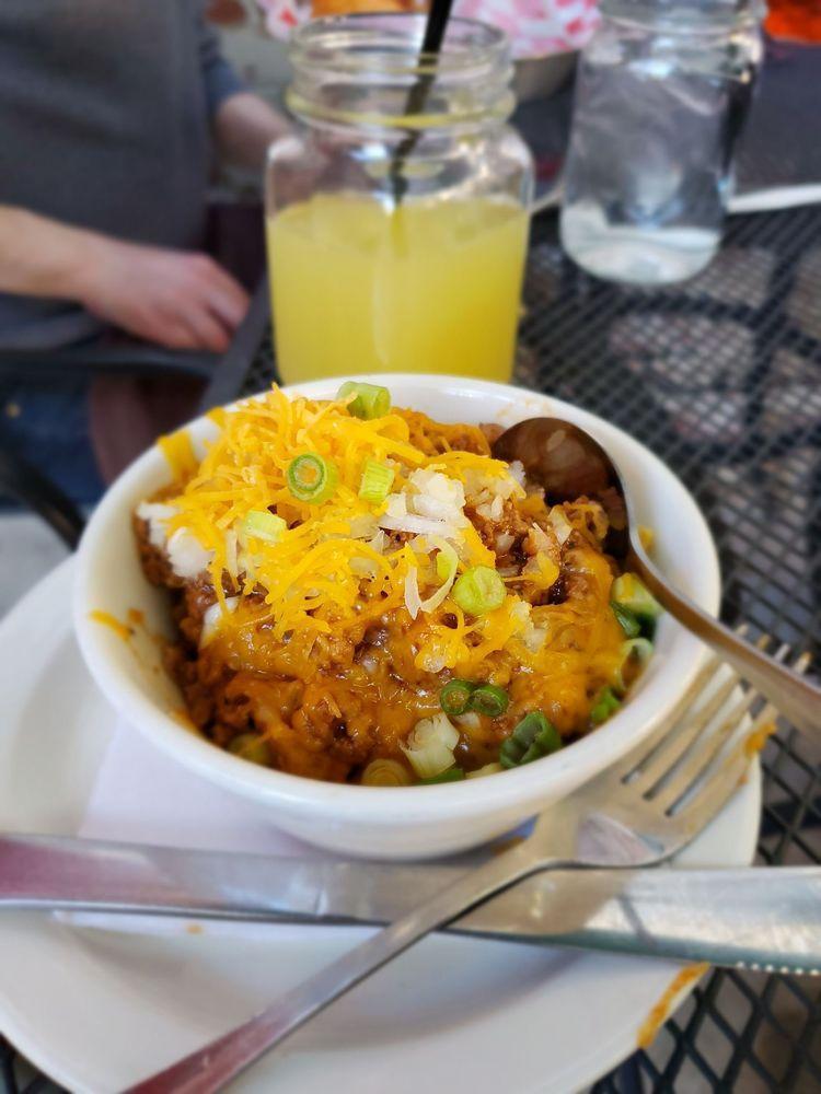 Frito Pie · Cup of our homemade chili with fritos, cheddar, white and green onion.