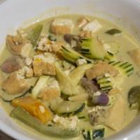 Green Curry · Gang khiew-wan. Bamboo shoots, zucchini, eggplant, bell pepper, and Thai basil in coconut mi...