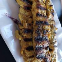 Chicken Satay · Chicken breast skewers marinated with Thai herbs and honey, grilled to perfection. Served wi...