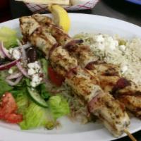 Chicken Souvlaki Platter · 2 Chicken skewers served with a side greek salad.  Comes with your choice of lemon rice or g...