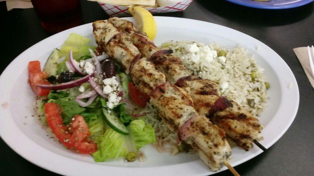 Chicken Souvlaki Platter · 2 Chicken skewers served with a side greek salad.  Comes with your choice of lemon rice or greek fries, pita bread and tzatziki.

Note: Prices are 30% higher here than in store. Call us for pick up!