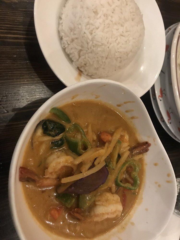 Red Curry · Red curry and coconut milk with bamboo shoot, bell pepper, eggplant and basil. Spicy.