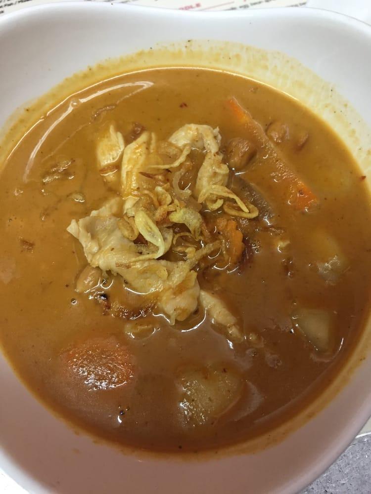 Massaman Curry · Thai favorite curry with potatoes, onion, carrot and roast peanut in coconut milk. Mild.