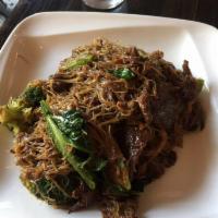 Black Noodles · Your choice of protein with rice vermicelli, egg, broccoli and asian broccoli in black soy s...