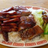 Roasted Duck Over Rice · 