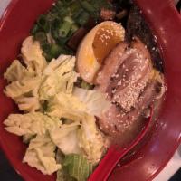 Hokkaido Tonkotsu Miso Ramen · Wavy noodles, pork bone broth, pork belly, scallions, napa cabbage, braised egg (soft-boiled...