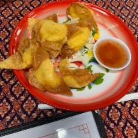 Crab Rangoon · Deep fried cream cheese dumplings. Served with sweet and sour sauce.