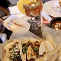 Tacos · Includes cilantro, ceballa and salsa of your choice.