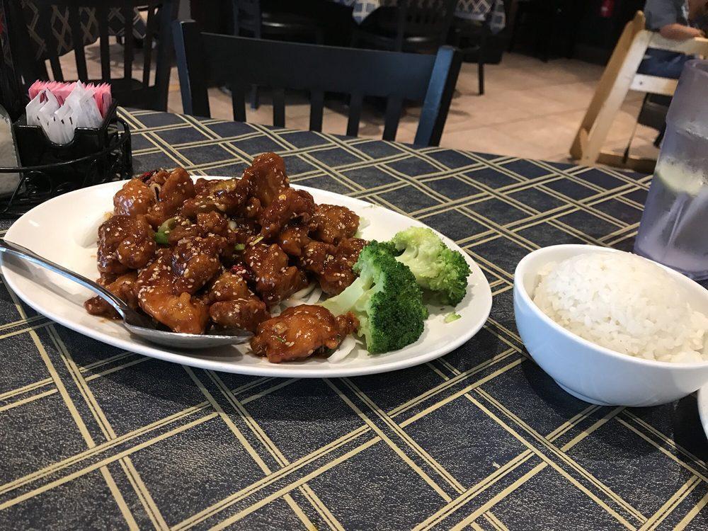 Sesame Chicken · Deep fried chunks of boneless chicken, sauteed in a spicy sauce and sprinkled with sesame seeds. Spicy.