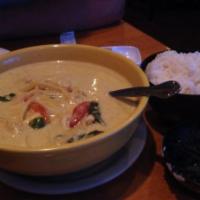 Green Curry · Chicken, beef, or pork in green curry with coconut milk, bell pepper, bamboo shoots and basi...
