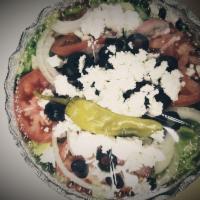 Greek Salad · Mixed greens, tomatoes, onions, olives, feta cheese, pepperoncini peppers and house dressing...